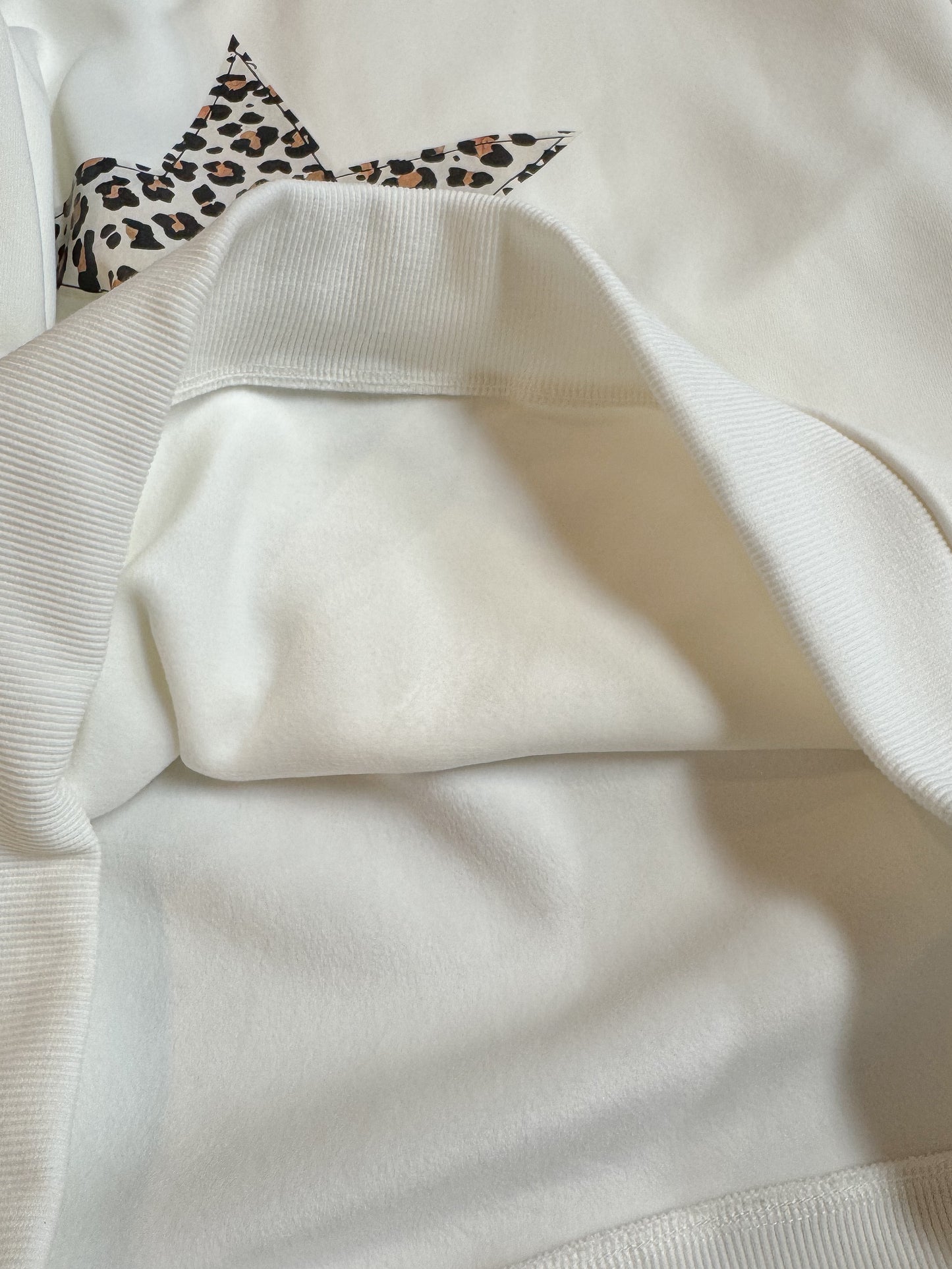 【Official限定価格】ヒョウ柄星トレーナー